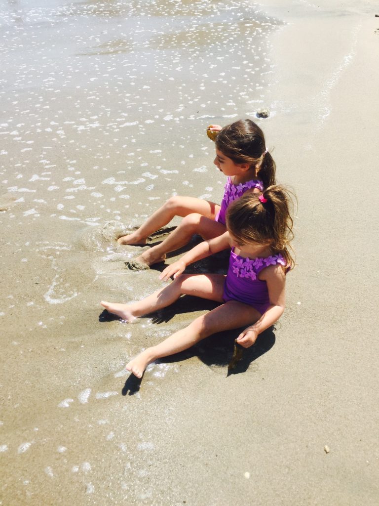 sisters-sand-beach-family-cautious-parenting